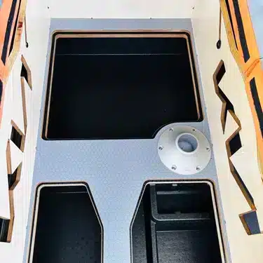 Top-down view of Campal camper unit interior showing precision cutouts for Kia PV5 floor anchor points and table mount